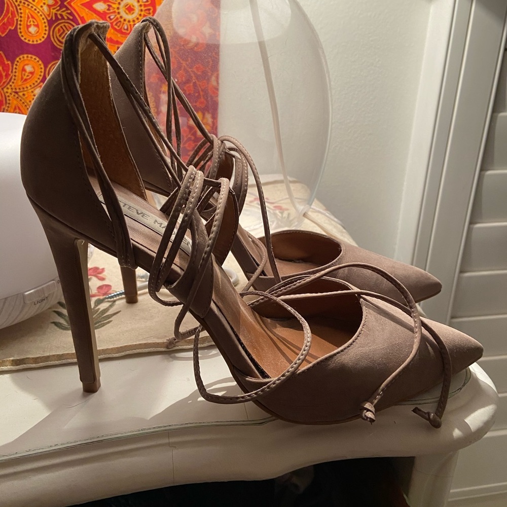 Tan suede pumps.